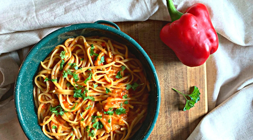Vegan red pepper pasta on a plate.
